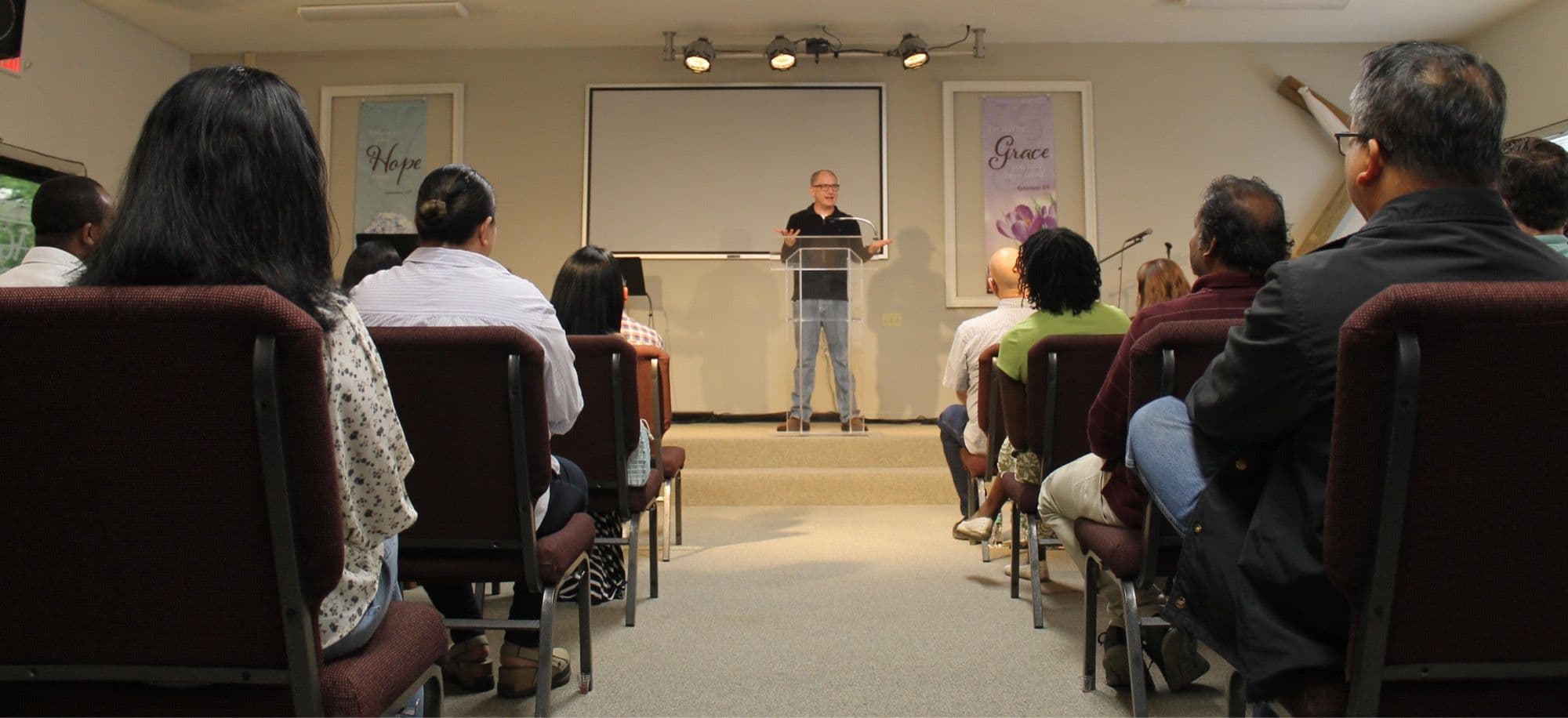 Pastor Chris preaching